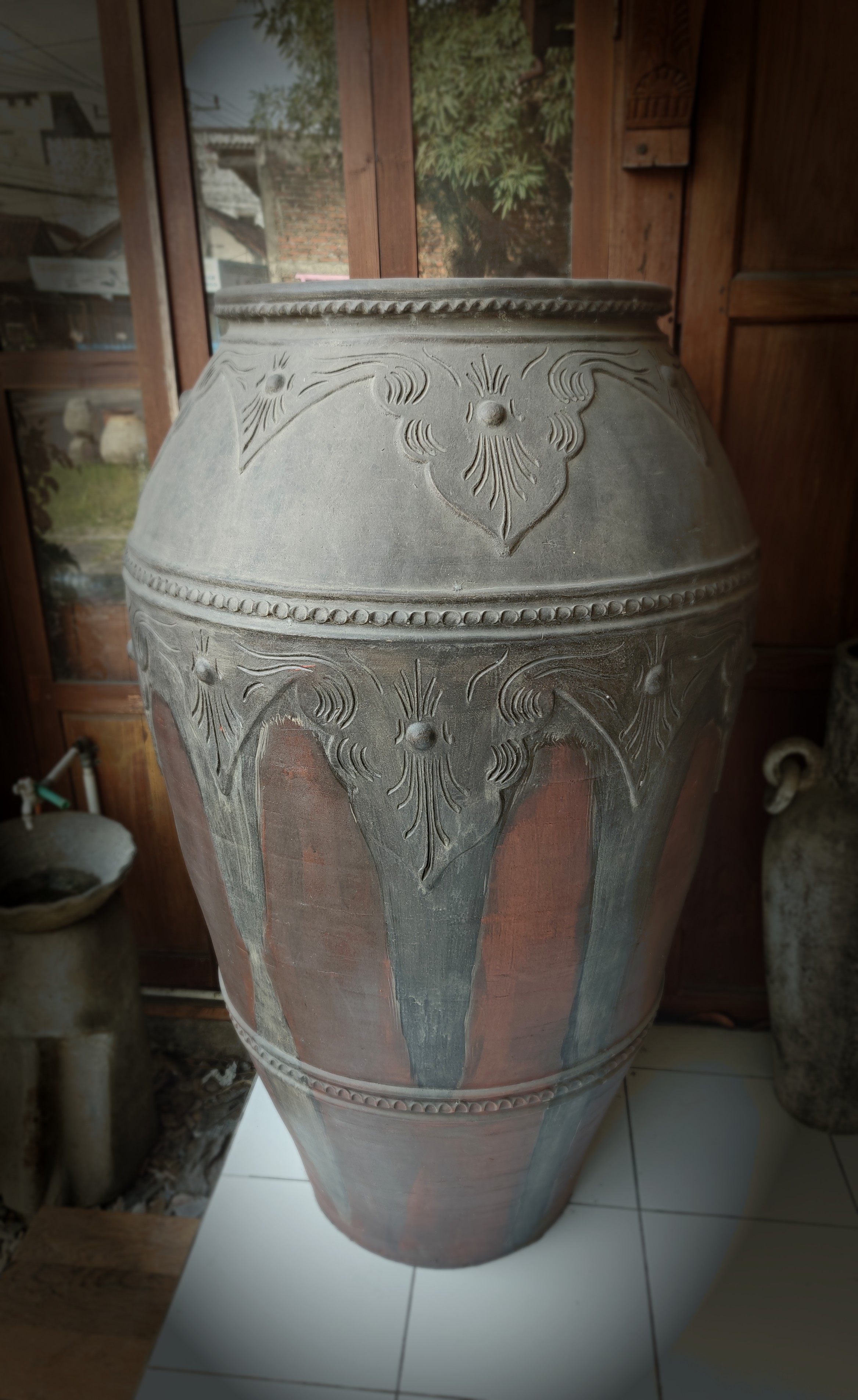 Carved Terracotta Urn