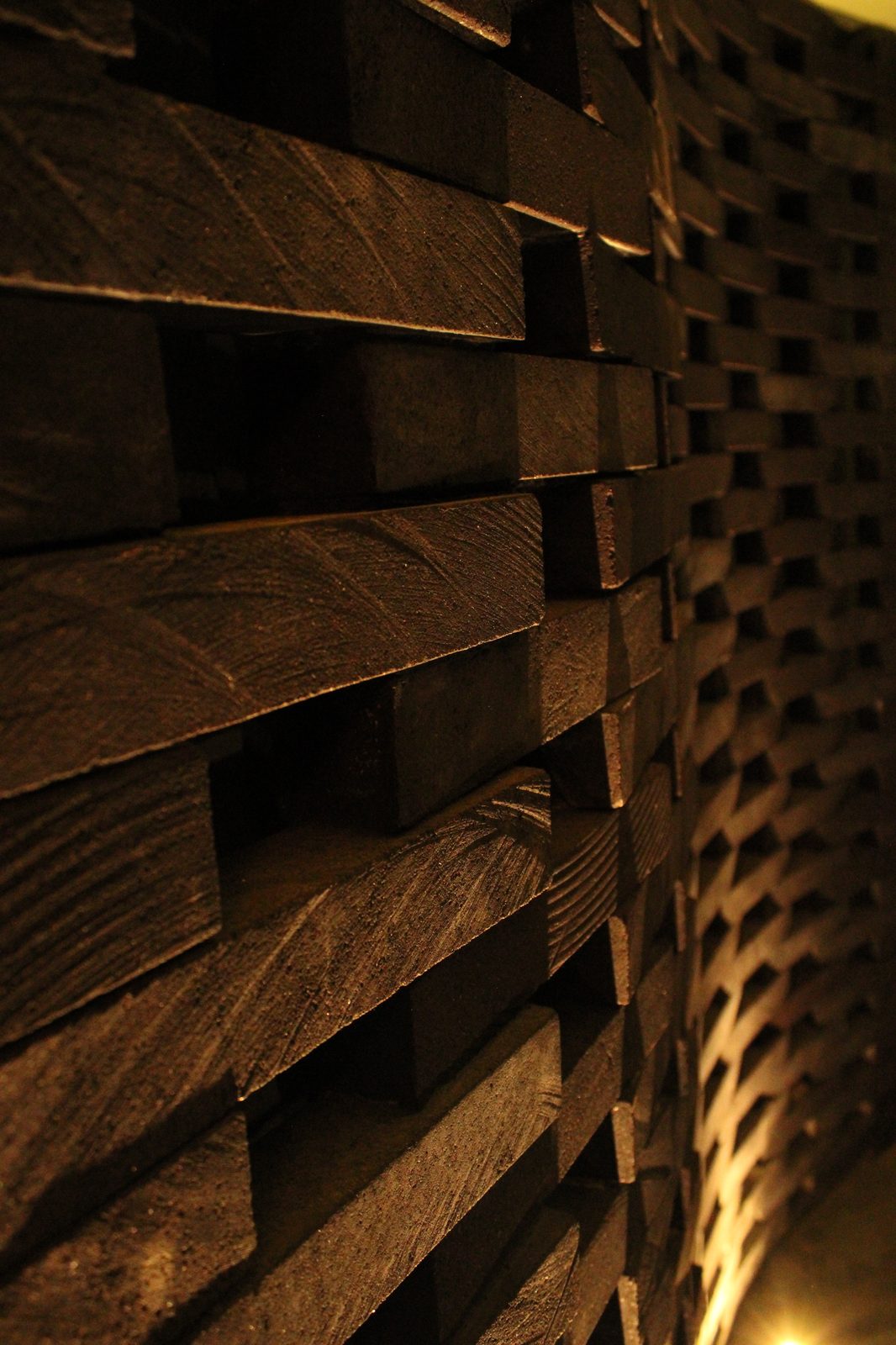 KAYU Lava Stone grid installation
