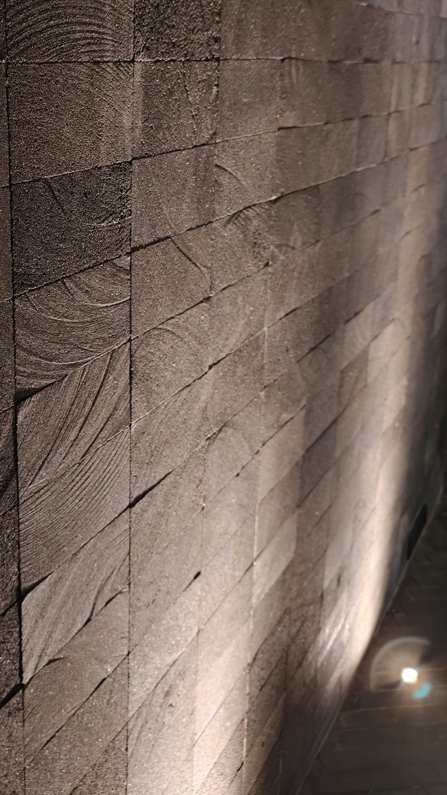 Lava Stone carved texture close-up with dramatic lighting